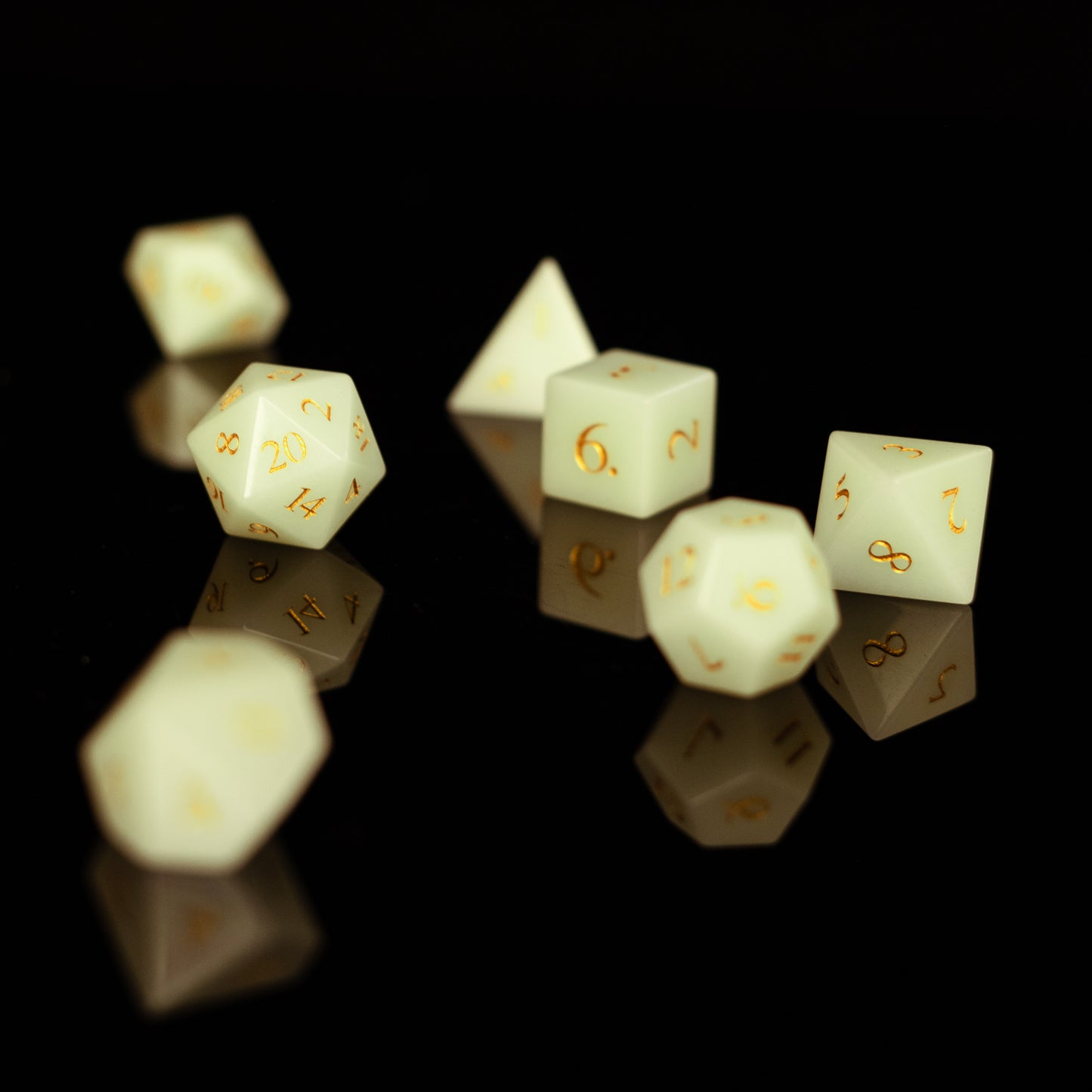 Roll Britannia Glow in the Dark Gemstone Dnd Dice Set on branded leather dice tray